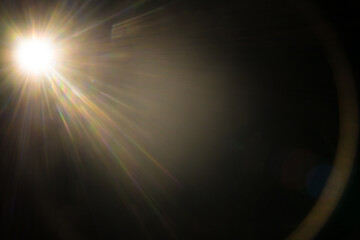 Abstract Natural Sun flare on the black