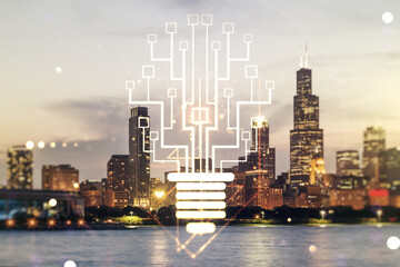 Fototapeta na wymiar Double exposure of virtual creative light bulb hologram with chip on Chicago city skyscrapers background, idea and brainstorming concept