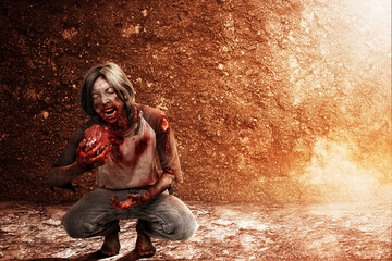 Scary zombie with blood and wound on his body eat the raw meat