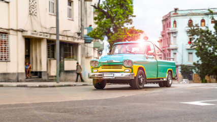 Fototapeta na wymiar Havana, Cuba. Cars on the vibrant city`s streets.
