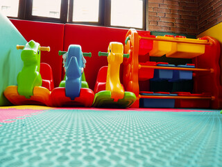 Children's playground, playroom with plastic colorful educational, preschoolers kindergarten toys kid.