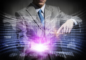 Businessman in suit using virtual interface