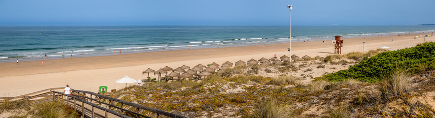 Sand dunes that give access to La Barrosa beach in Sancti Petri, Cádiz, Spain. © josevgluis