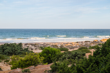 Sand dunes that give access to La Barrosa beach in Sancti Petri, Cádiz, Spain.