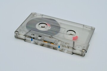 Old audio cassette tape on white background