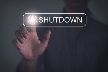 human hand press shutdown button on virtual screen with technology concept. Free space for text or design.