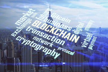 Double exposure of crypto currency theme hologram drawing and city veiw background. Concept of blockchain and bitcoin.