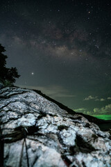 Long exposure Night Photography with Milky way over sea in phuket thailand.