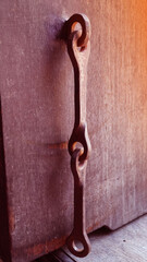 Old rusty iron ring close up image with a solid iron ring to secure on the old door and  surface