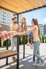 Young family spending time together and feeling good