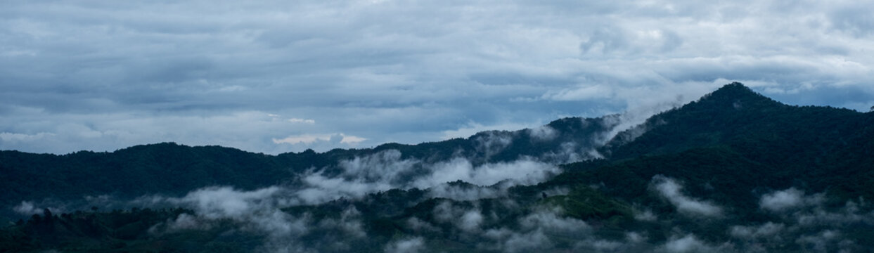 Landscape image of foggy greenery rainforest mountains and hills © Farknot Architect