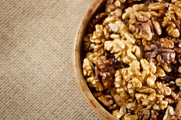 fresh and organic walnuts on plate