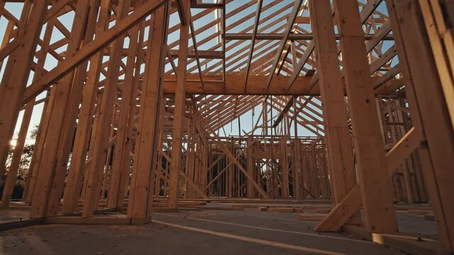 Moving through a new home construction with framing.