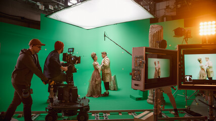 On Set: Famous Female Director Controls Cameraman Shooting Green Screen Scene with Two Actors...