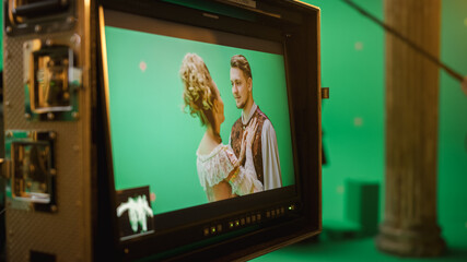 On Set Display Showing: Green Screen Scene with Two Actors Talented Wearing Renaissance Costumes Doing Romantic Drama Dialogue. Film Studio Professional Crew Shooting Historical Costume Drama Movie