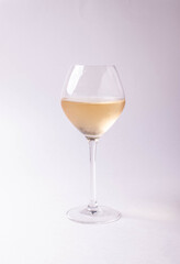 a glass of natural white wine