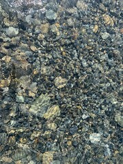 Sea pebbles background, natural colors