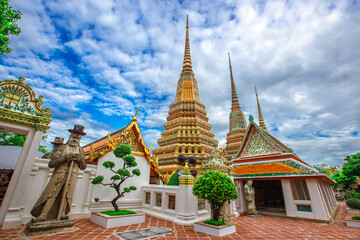 Fototapeta na wymiar background of important religious attractions in Bangkok (Wat Phra Chetuphon (Wat Pho - reclining Buddha), a large pagoda and beautiful sculptural art give future generations to explore its history