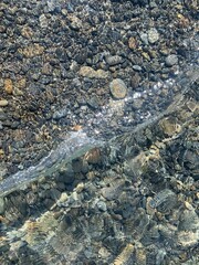 Sea pebbles background, natural colors