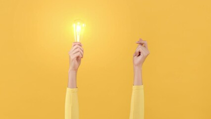 Woman hand doing finger snapping to turn on light bulb for creative and idea generation concepts
