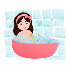 Naklejka premium Happy little girl taking bath, daily routine activity, bathtub with foam bubles, yellow rubber ducks, games in bathroom, having fun