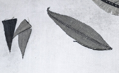 Making of bird feather from old jeans. Step 2. Sew with a machine zig-zag stich a shaft (rachis) of the feather.
