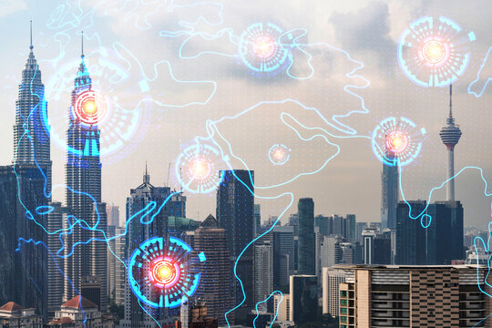 World planet Earth map hologram over panorama city view of Kuala Lumpur, Malaysia, Asia. The concept of international connections and business. Multi Exposure.