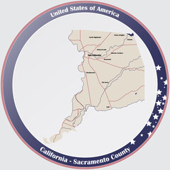 Round button with detailed map of Sacramento County in California, USA.
