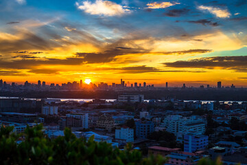 blurry panoramic background of the light of the morning sun and the various condominiums, showing the distribution of many yard shelters today.