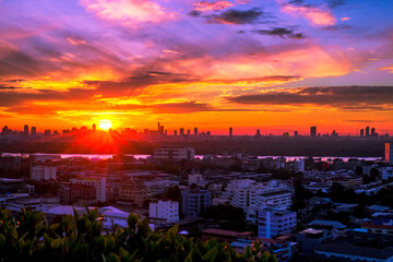blurry panoramic background of the light of the morning sun and the various condominiums, showing the distribution of many yard shelters today.