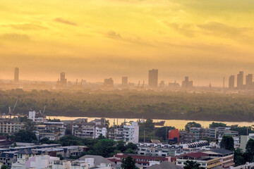 Obraz premium blurry panoramic background of the light of the morning sun and the various condominiums, showing the distribution of many yard shelters today.