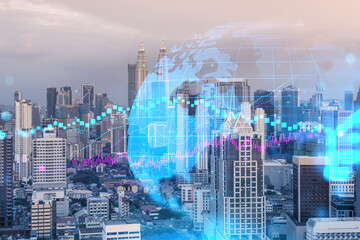Obraz na płótnie Canvas Glowing FOREX graph hologram, aerial panoramic cityscape of Kuala Lumpur at sunset. Stock and bond trading in KL, Malaysia, Asia. The concept of fund management. Double exposure.