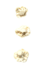 Set of pieces of cauliflower on a white background