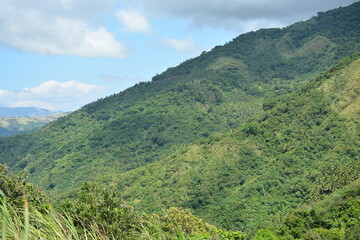 Naklejka premium Rock formation at mountain view white beach resort