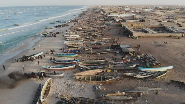 Panoramic view of the beach in Mauritania. Beach in Mauritania. Beach. View. 4k. 4k view.Fishermen. They're fishing. Sea. Ocean. Craft. Bird's eye view. Mauritania in 4k. panorama in 4k. Mauritania.