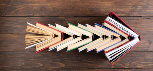 Arrow Shape made of books love to wisdom, science and education. Reading and writing concept