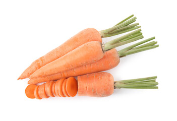 Whole and cut ripe carrots isolated on white, top view