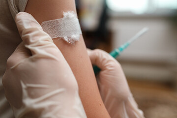 Nurse vaccinating  in arm. Health and care concept