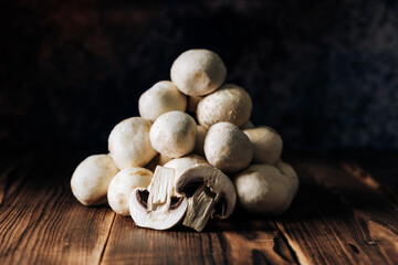 Mushrooms on a wooden background close up