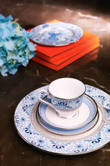 antique porcelain plate and cup on the table