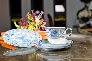 antique porcelain plate and cup on the table