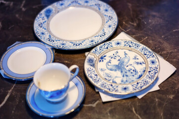 antique porcelain plate and cup on the table