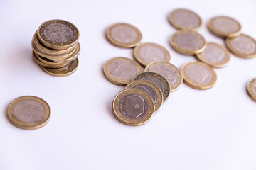Euro coins at a white background economy europe with copy space