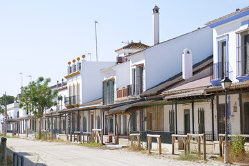 Fototapeta na wymiar Typical sandy street in El Rocio, Huelva, Spain.