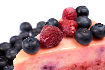 Cheesecake with berries close-up. Concept food photography. Sweets and berries. Copy space. Beautiful background.