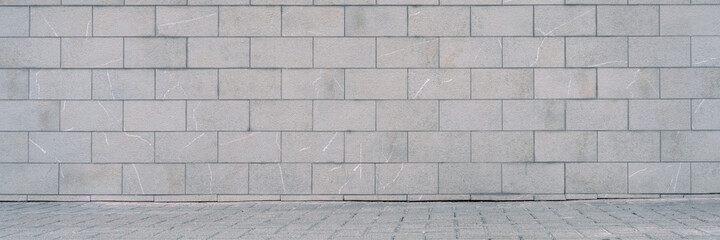 Obraz premium panoramic shot of brick building wall with empty spacious space for advertising