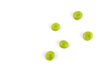 Green young peas, isolated on white background. Close-up. Top view