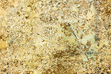 Great colorful background or texture. Abstract concrete is aged with cracks, scratches and remnants of old paint in different shades. Rough concrete surface