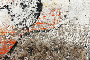 Background concrete wall, traces of weathering, worn wall damaged paint old paint. Remains of old paint on the painted concrete surface. Grungy concrete surface.