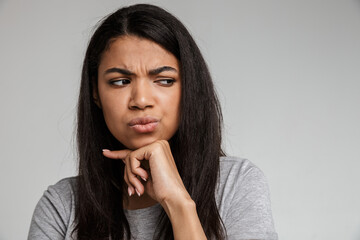 Portrait of young woman thinking